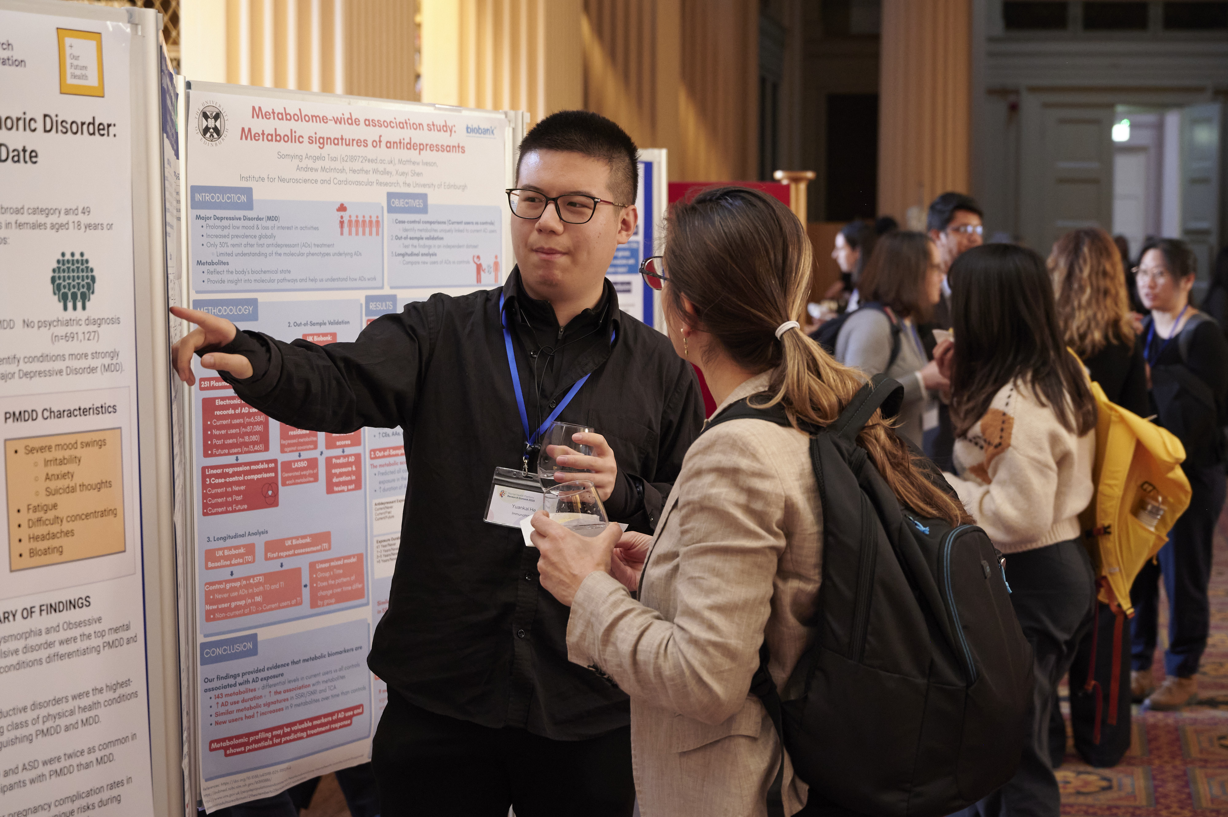 researchers at a poster